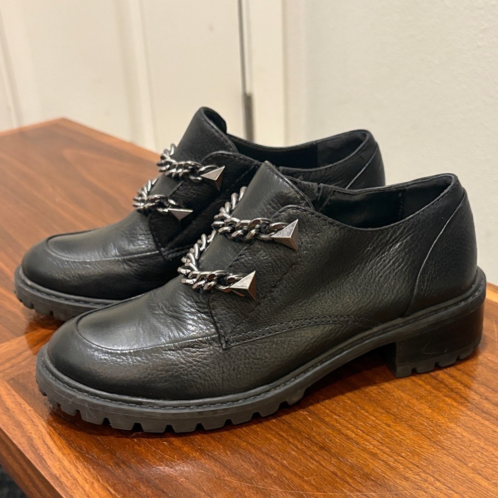 SCHUTZ Black Leather Loafers with Chain Accent